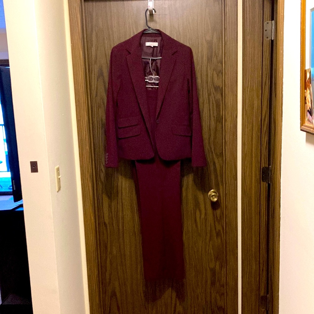 3, New York and Company size 10 burgundy, gray, or blue pin stripe suits.